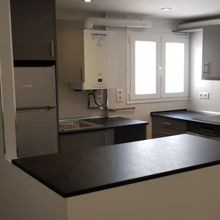 Cocina de madera en tonos grisáceos | ElaboMón